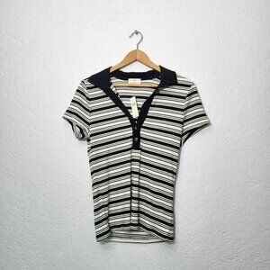 Black and white striped collared polo shirt